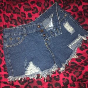 Distressed denim shorts